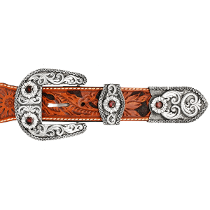 A custom western three piece belt buckle set featuring silver scrollwork and red zirconia stones